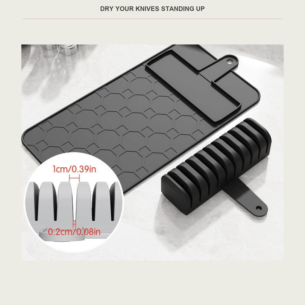 Black silicone knife drying mat with the slot block and blades standing upright