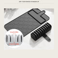 Black silicone knife drying mat with the slot block and blades standing upright