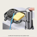 Sink soap dispenser clamped into the soap hole, with sponge and steel wool in the basket