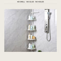 Tension pole shower shelf standing floor to ceiling in a tiled corner