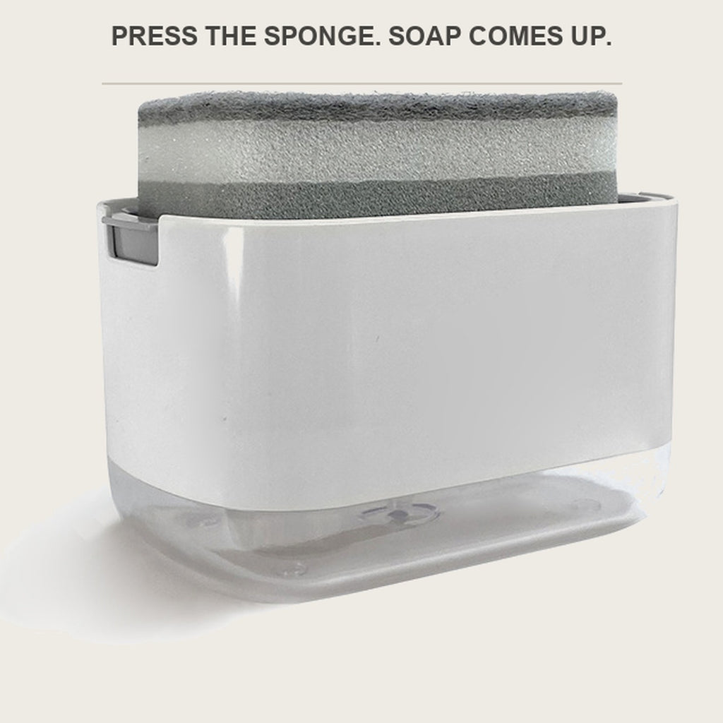 White soap dispenser box with a sponge sitting on the grid