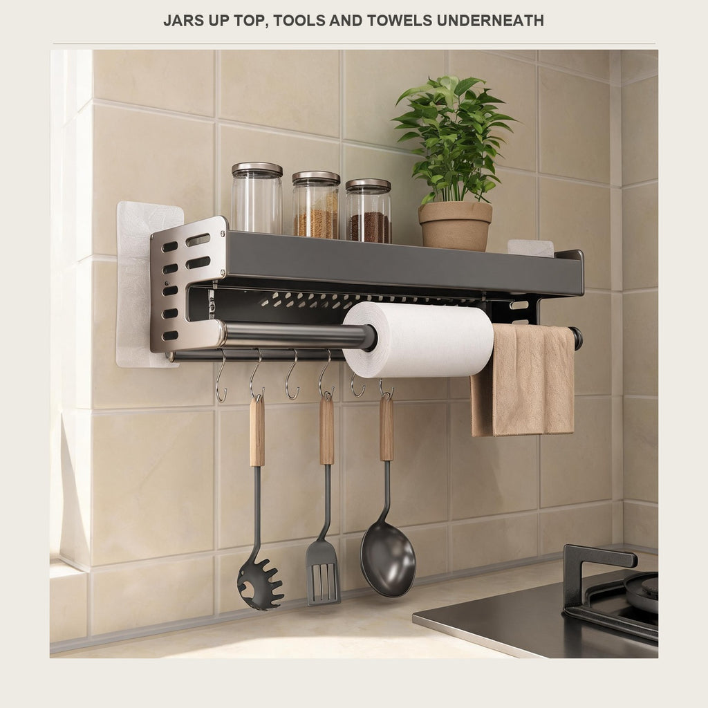Aluminium wall shelf above a kitchen counter holding spice jars, with utensils on the hooks below