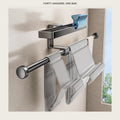 Wall mounted hanger holder with a row of hangers hanging below the clip tray