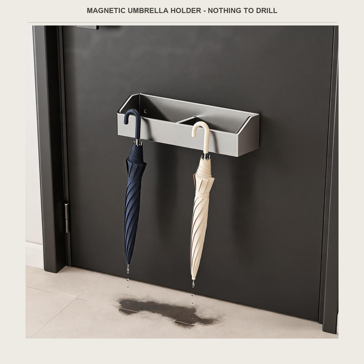 Magnetic umbrella holder clipped to a steel entry door holding a navy and a cream long umbrella