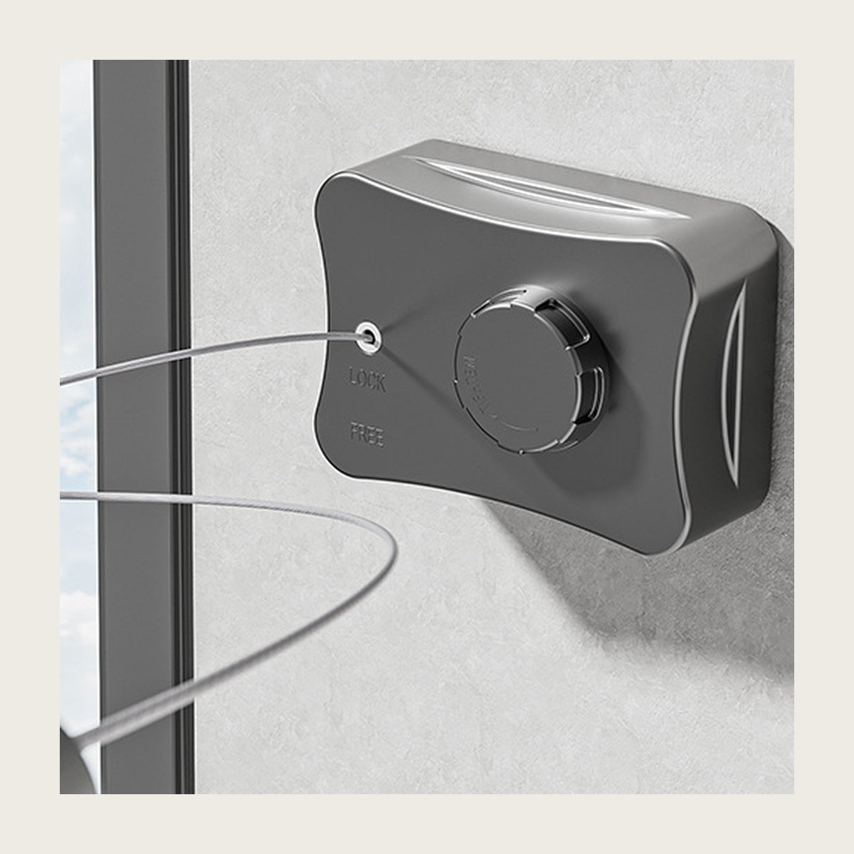 Grey retractable clothesline housing on a bathroom wall with the wire pulled out