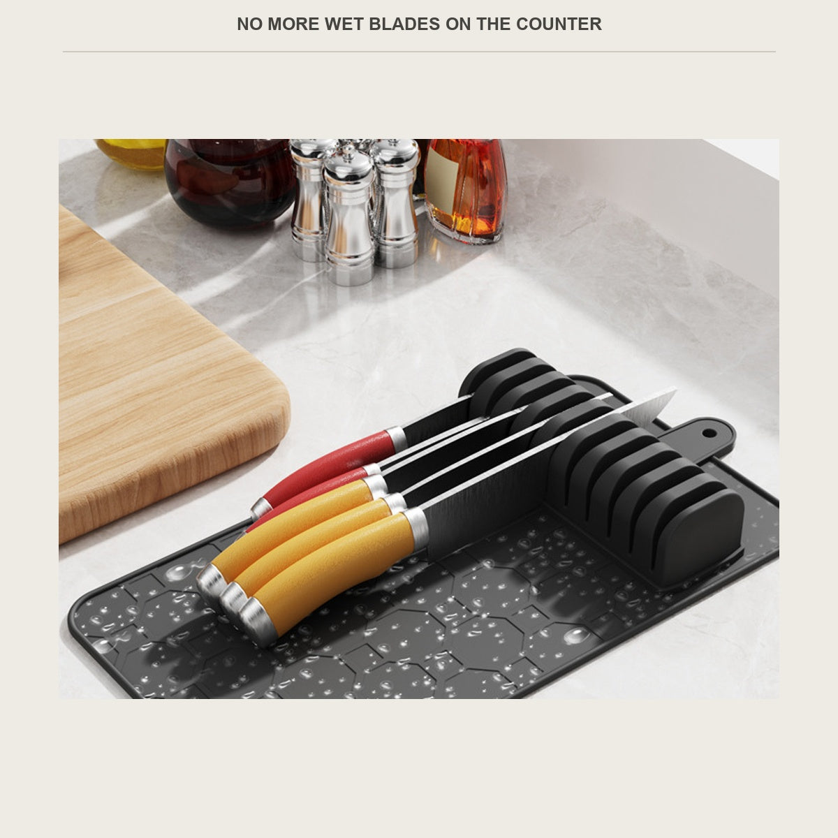 Knives drying upright on the silicone mat beside a sink