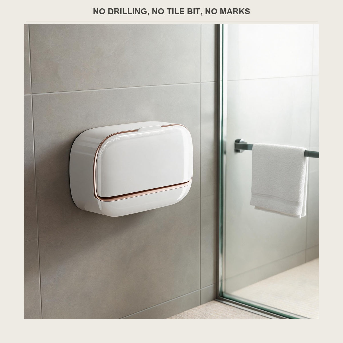The same soap box on shower tile with a folded towel in the background
