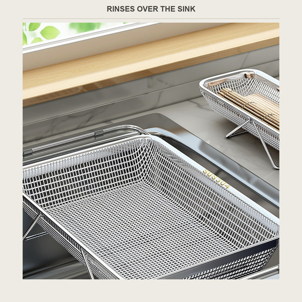 Rinse basket sitting over a kitchen sink next to a second basket holding chopsticks
