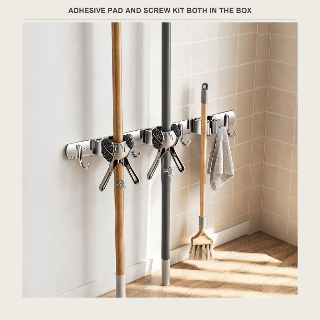 Laundry corner with mop, broom and brush handles held on a wall rail