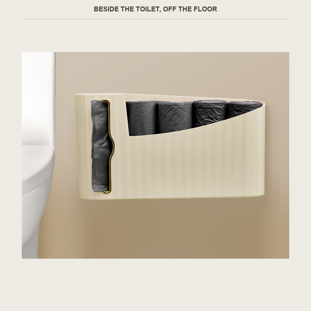 The bag caddy mounted on flat tile beside a toilet, one bag pulled out