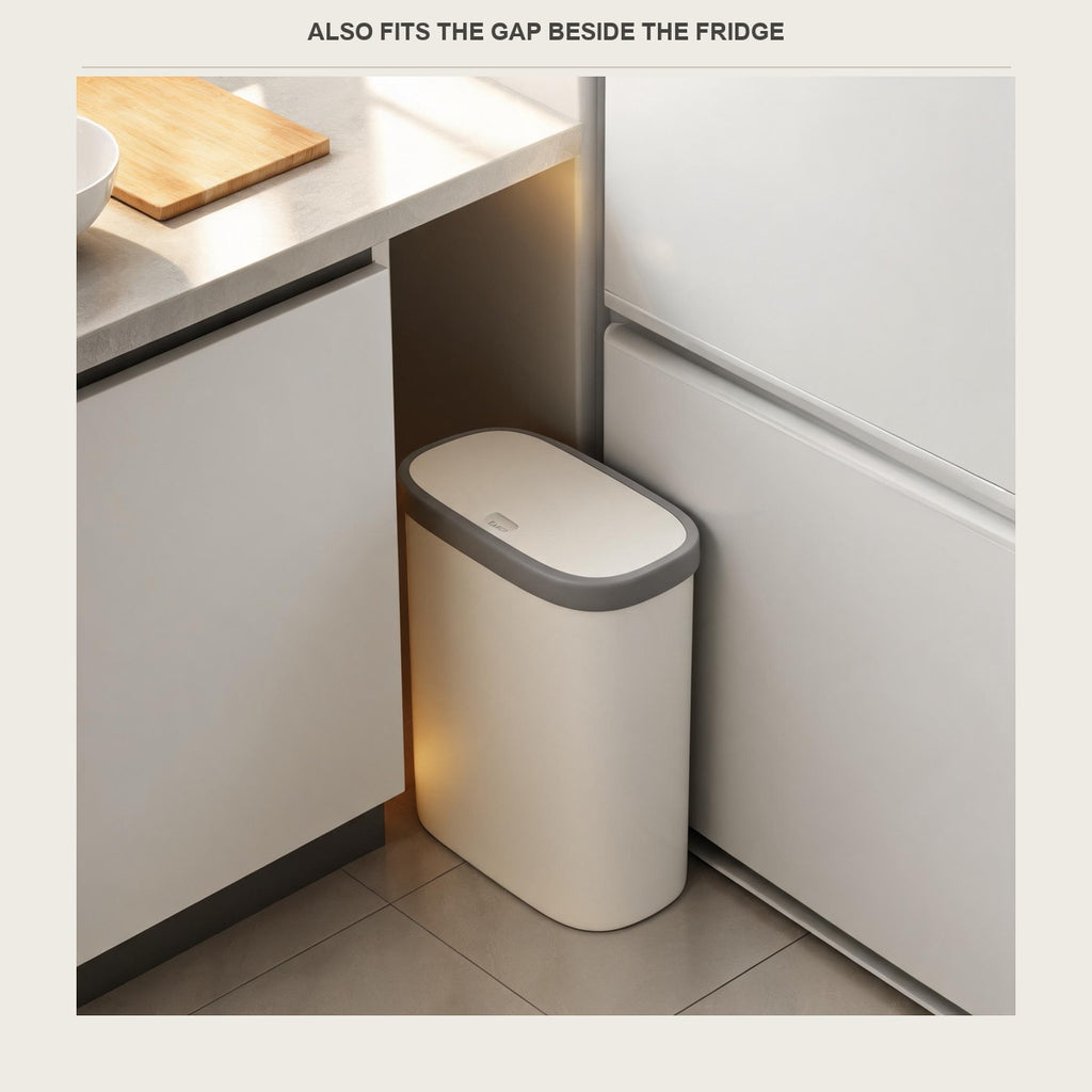 The slim bin pushed into the gap between a kitchen cabinet and the side of a fridge