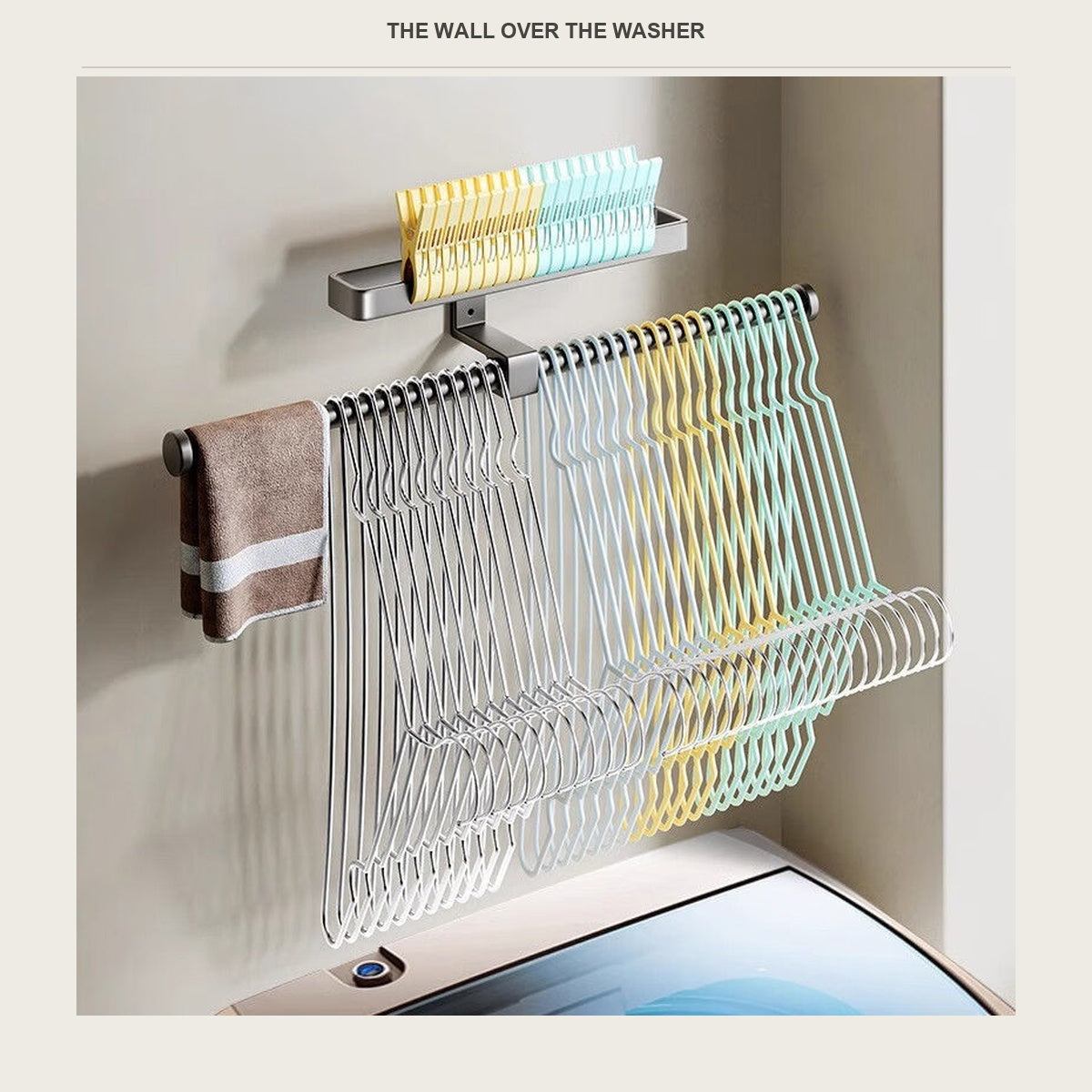 The hanger holder mounted on the wall above a washing machine