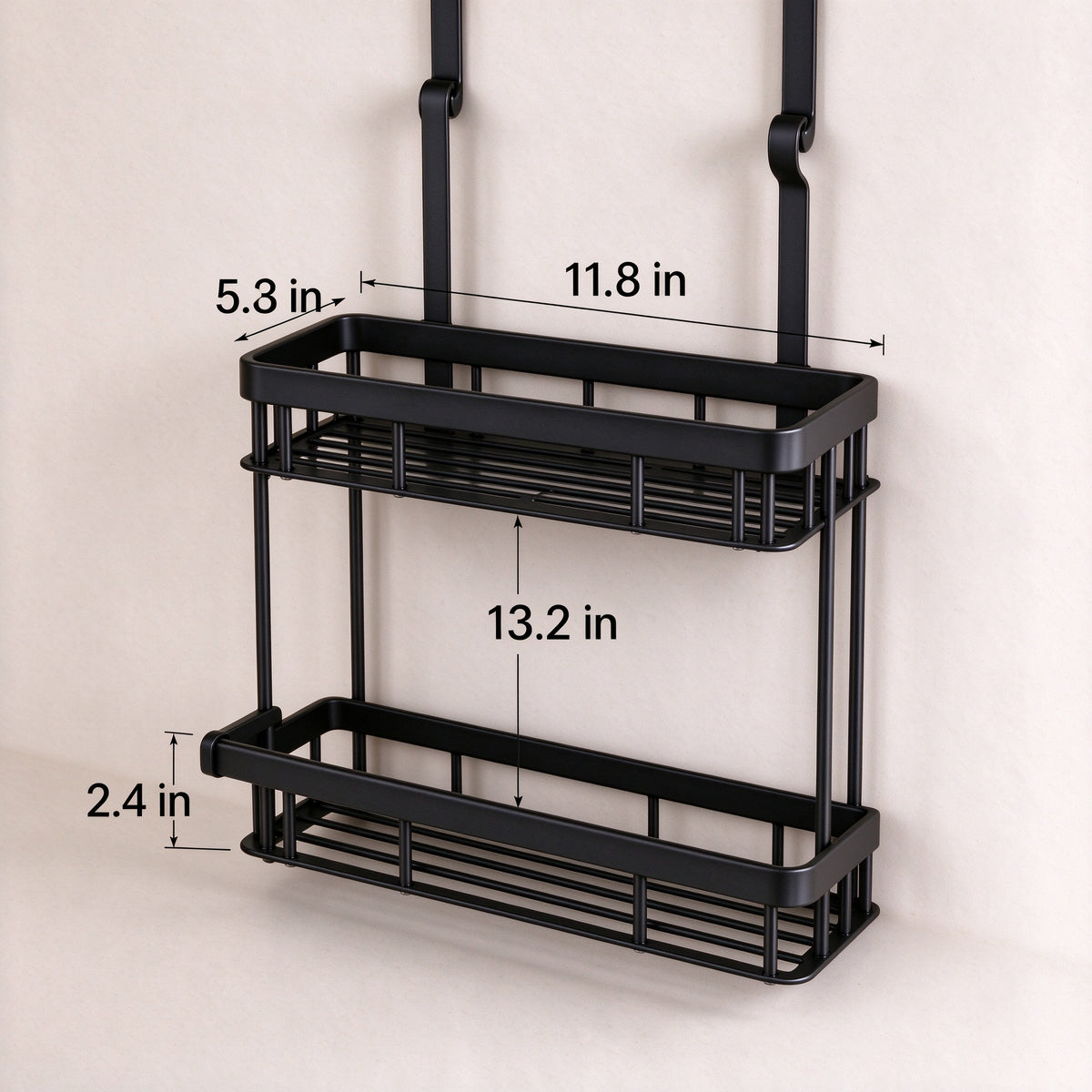 Shower caddy hung on the door edge in a small bathroom, bottles on both shelves