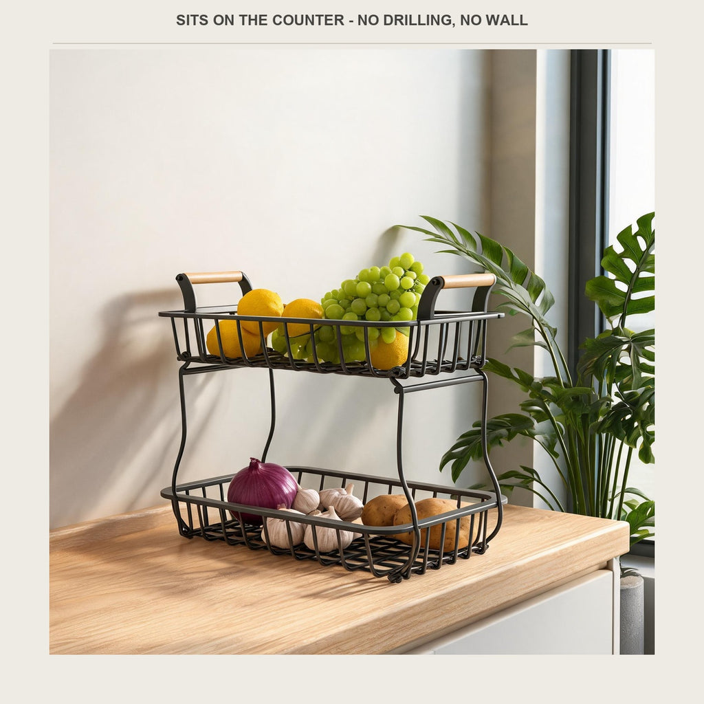Fruit rack on a sideboard with lemons and grapes above, onions and garlic below