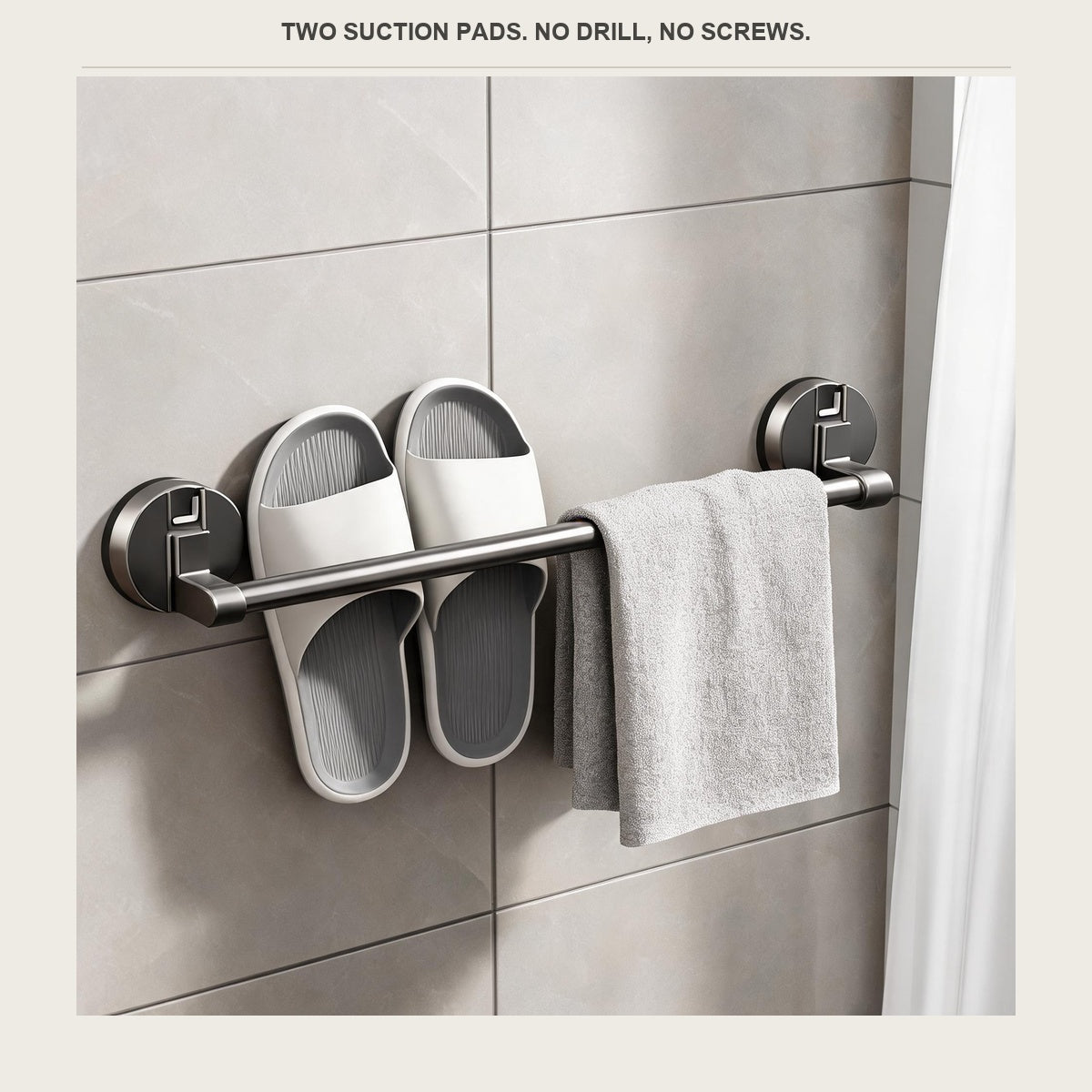The slipper rack on a shower wall with one pair of slippers and a folded towel over the bar