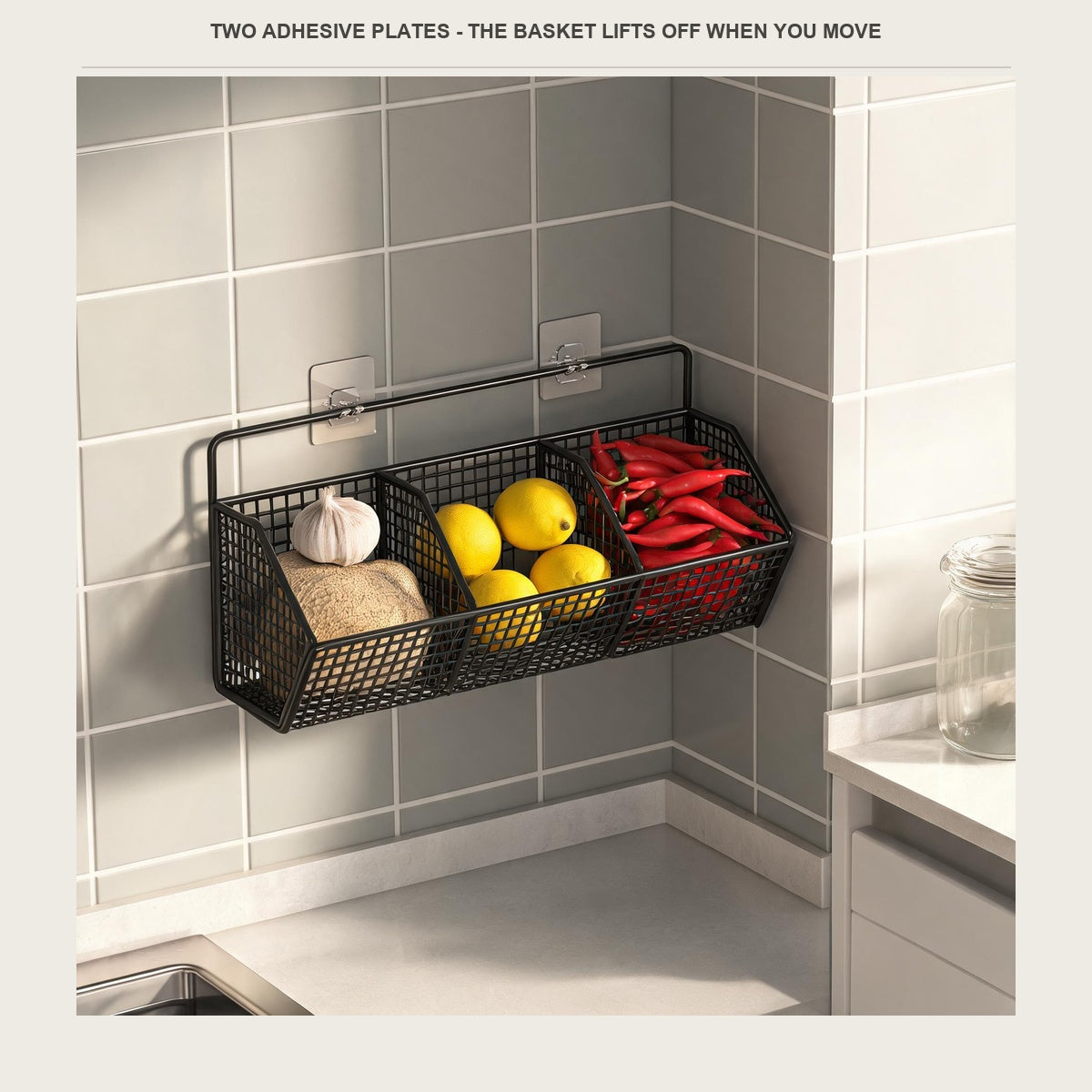 The wire basket mounted in a small kitchen corner with garlic, lemons and chillies inside