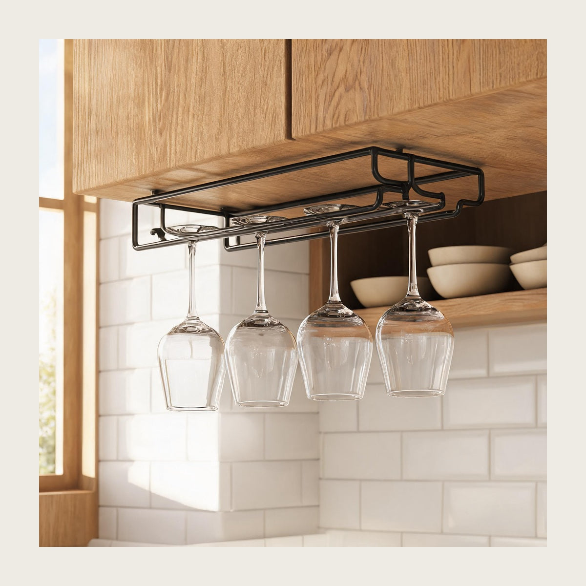 Wine glass rack mounted under kitchen cabinet with stemware stored