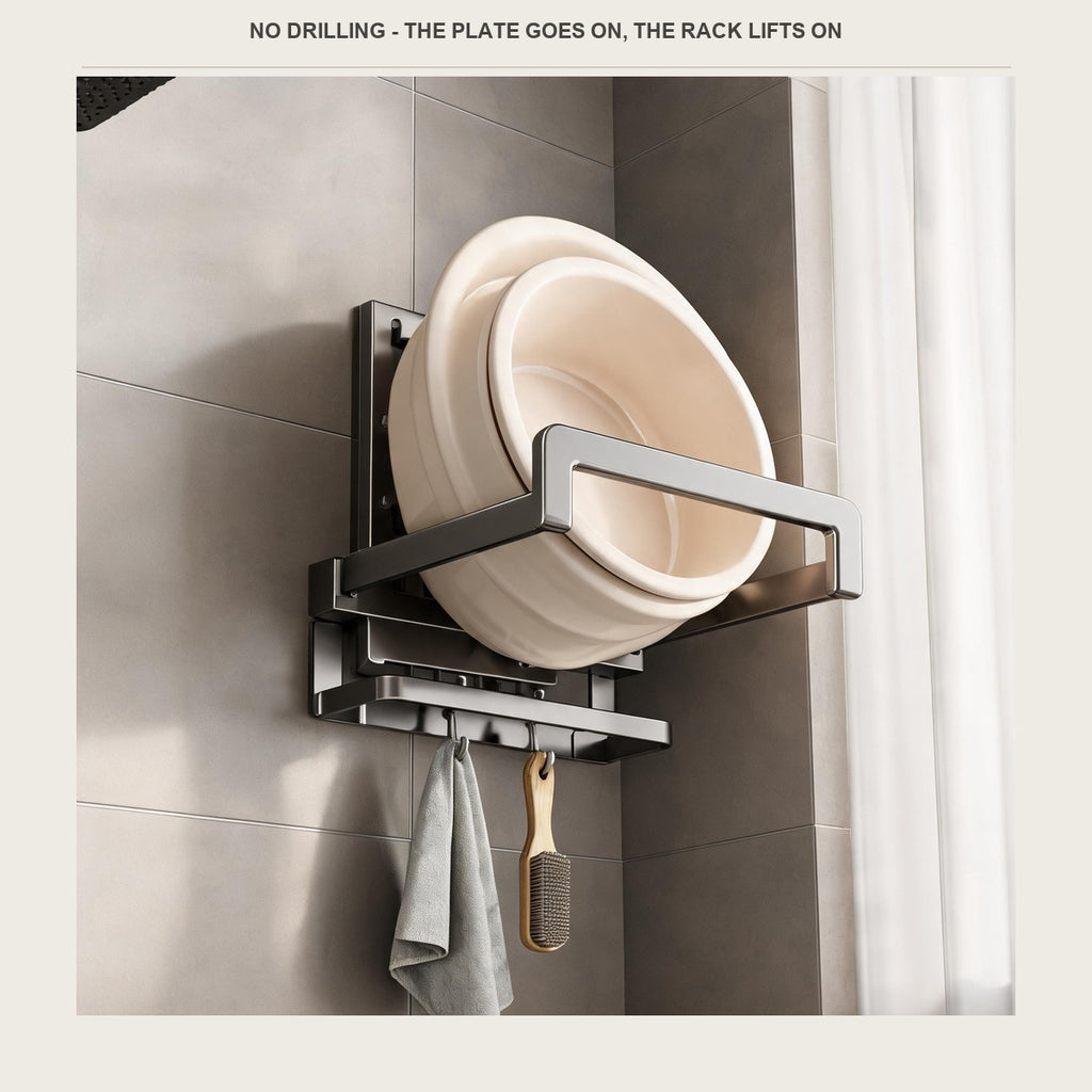 The gunmetal wall rack in a small shower room with a basin in the folded-out arms