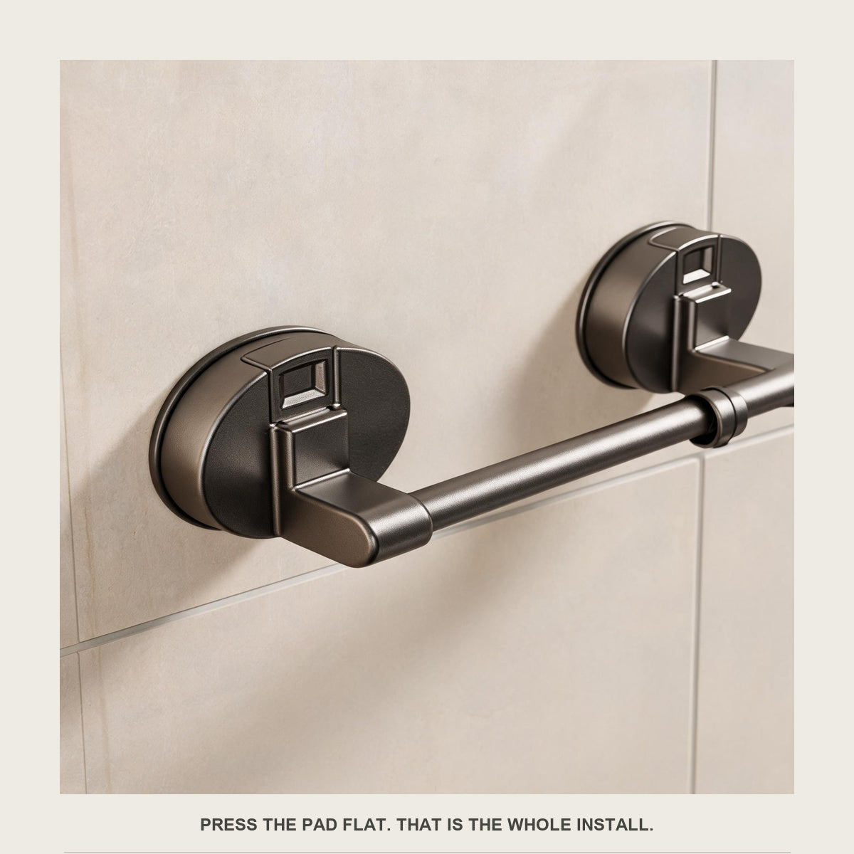 Close-up of the round suction pad pressed flat on tile with the locking latch on its face