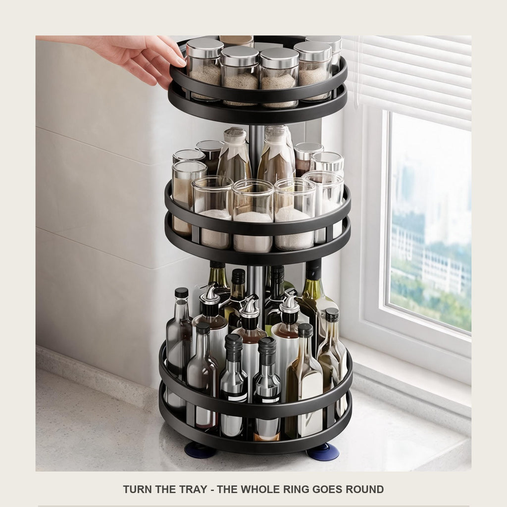 Close-up of a hand turning the top tray of the rotating spice rack