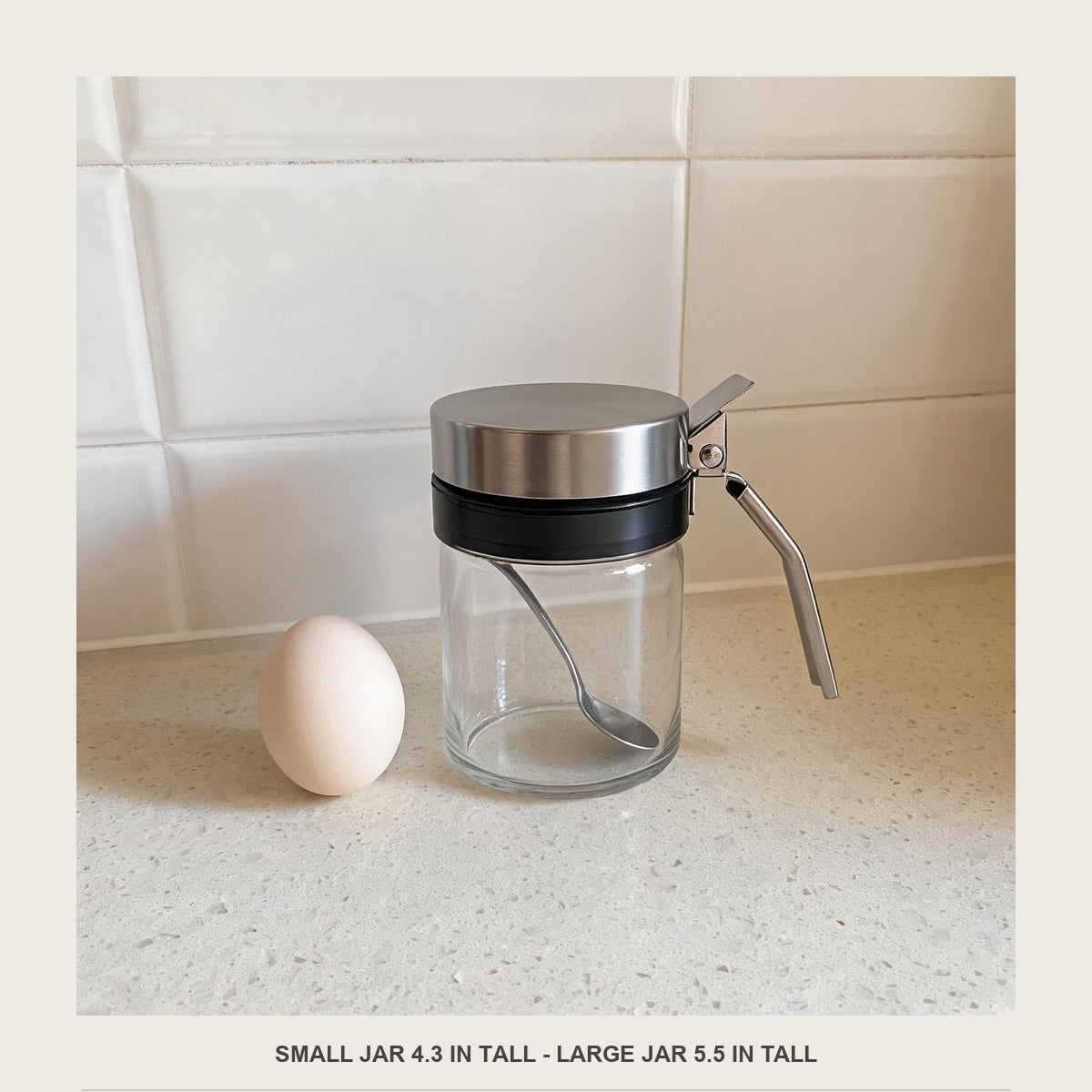 Spice jar beside an egg for scale on a kitchen counter