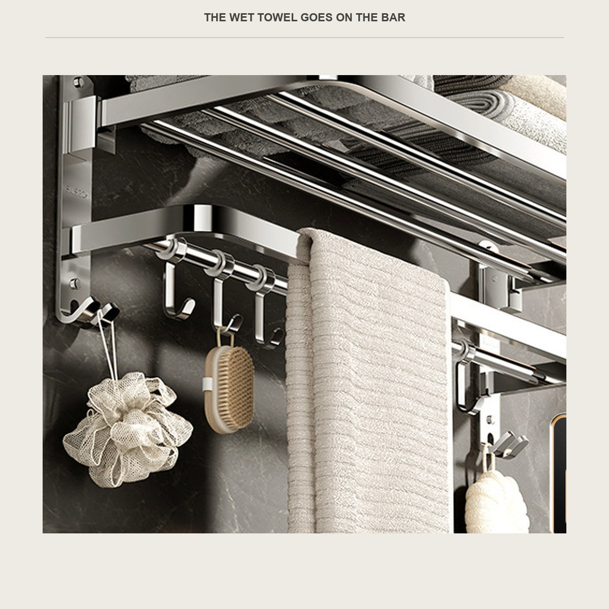 Wet towel hanging on the bar below the folded towels on the shelf