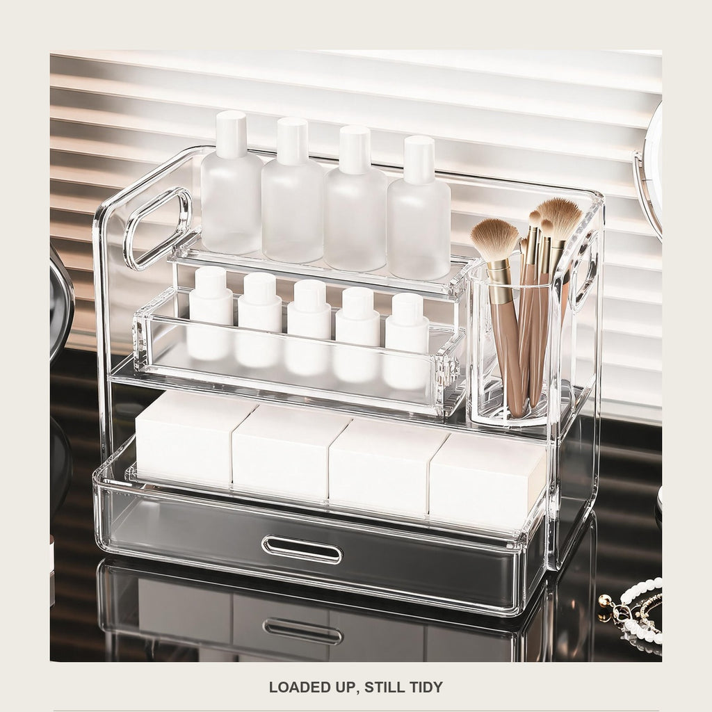 The acrylic organizer loaded with unbranded bottles, plain boxes and makeup brushes