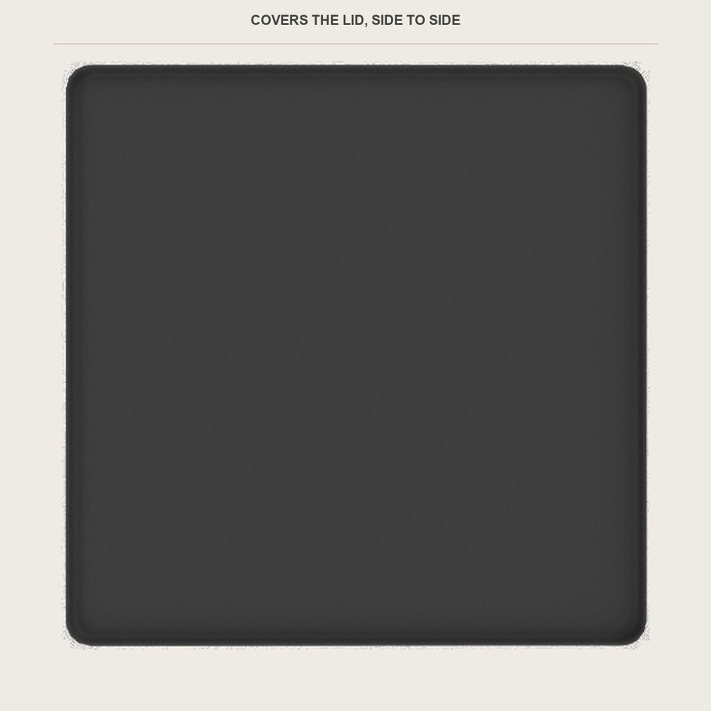 Full lid coverage of the dark grey washer top mat on a 24 inch machine