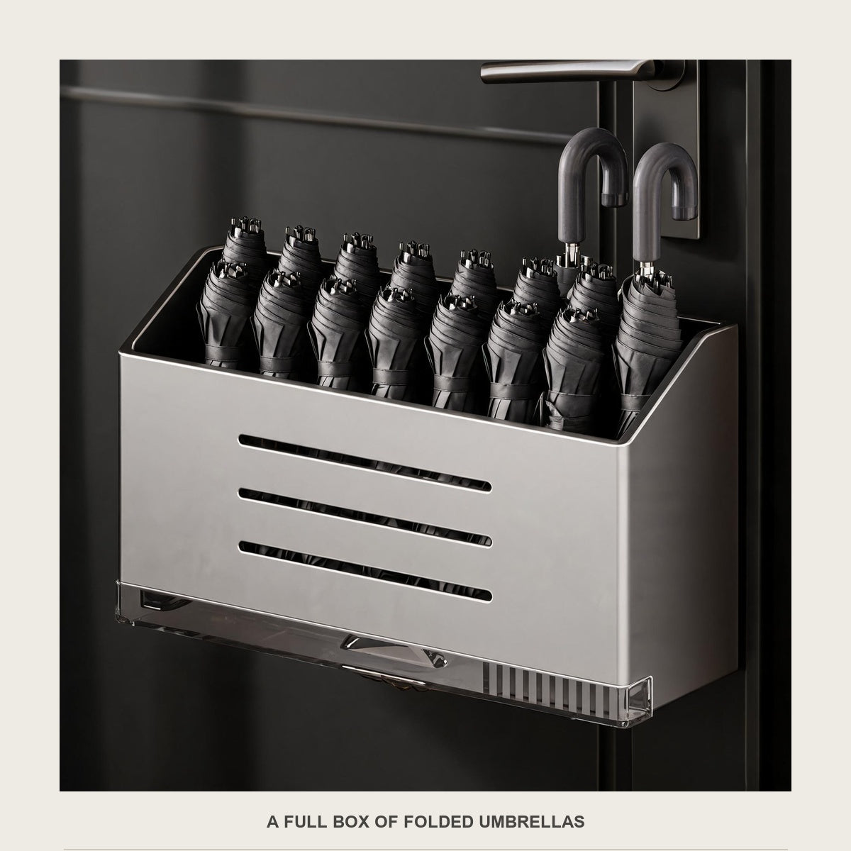 The drip-tray box packed with folded umbrellas standing upright, handles up