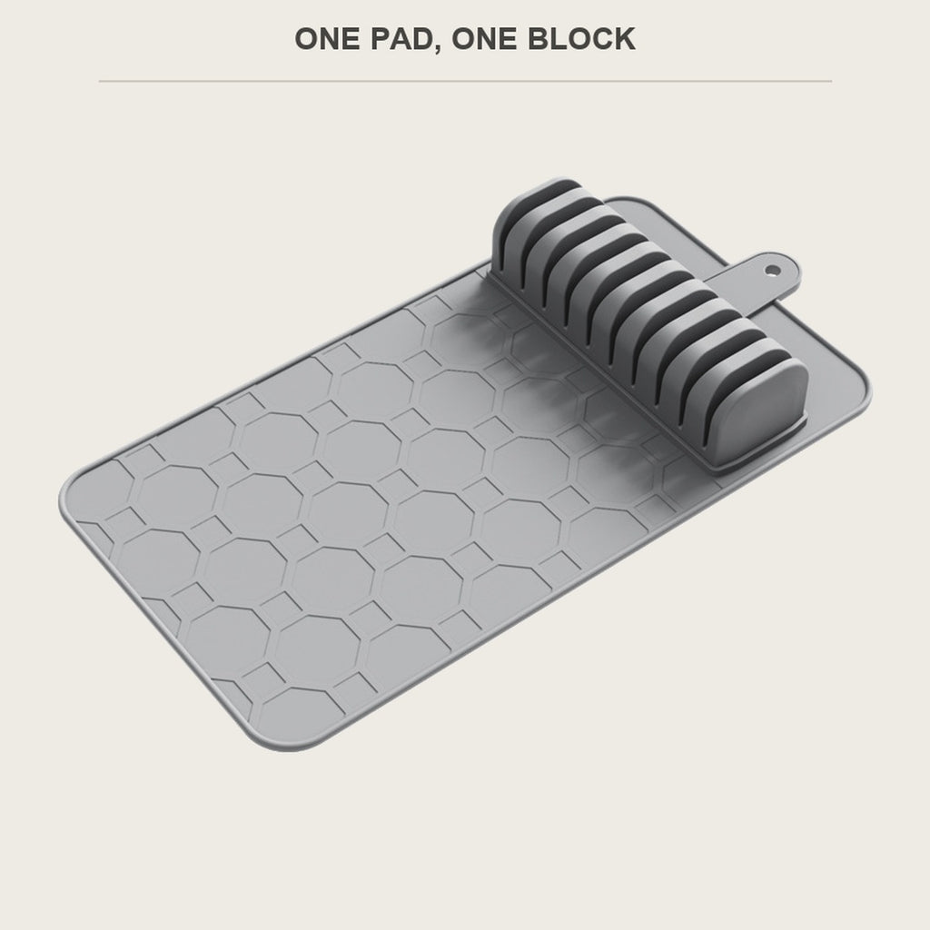 Grey knife drying mat and slot block on a light background