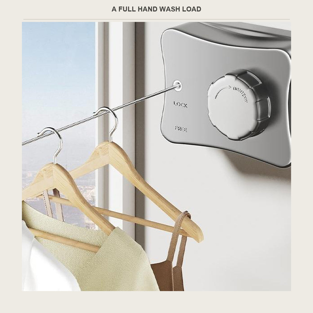 Hand washed clothes on wooden hangers hanging from the retractable line