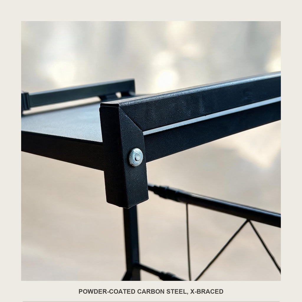 Close-up of the powder-coated carbon steel frame and the X-brace