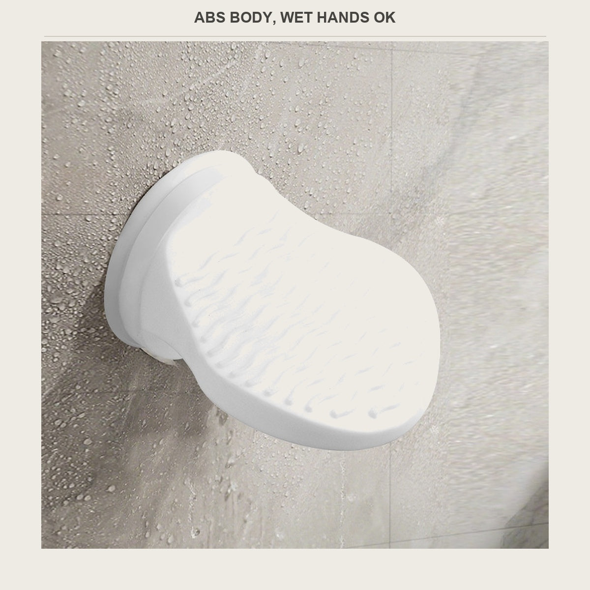 White shower foot rest stuck to a wet grey tiled wall