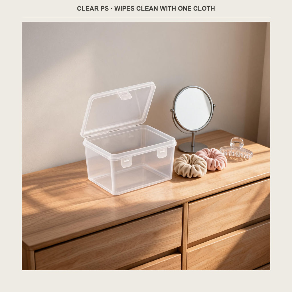 Clear polystyrene box with a hinged lid on a dresser top