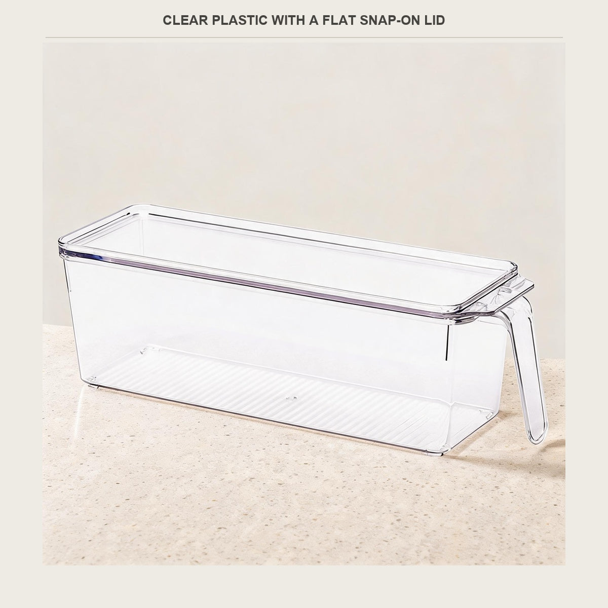 The clear rigid plastic and flat lid of the stackable fridge bin
