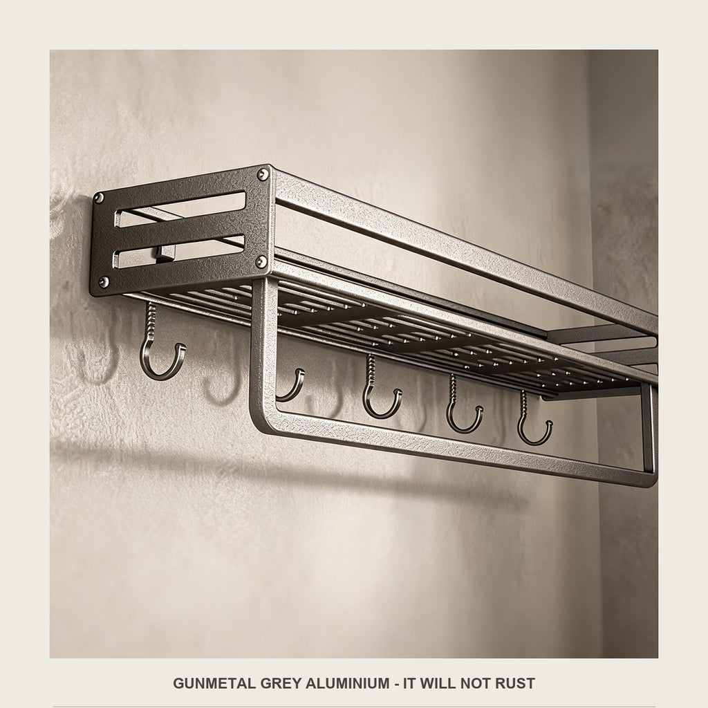 Close-up of the matte gunmetal grey aluminium tray and the perforated shelf floor