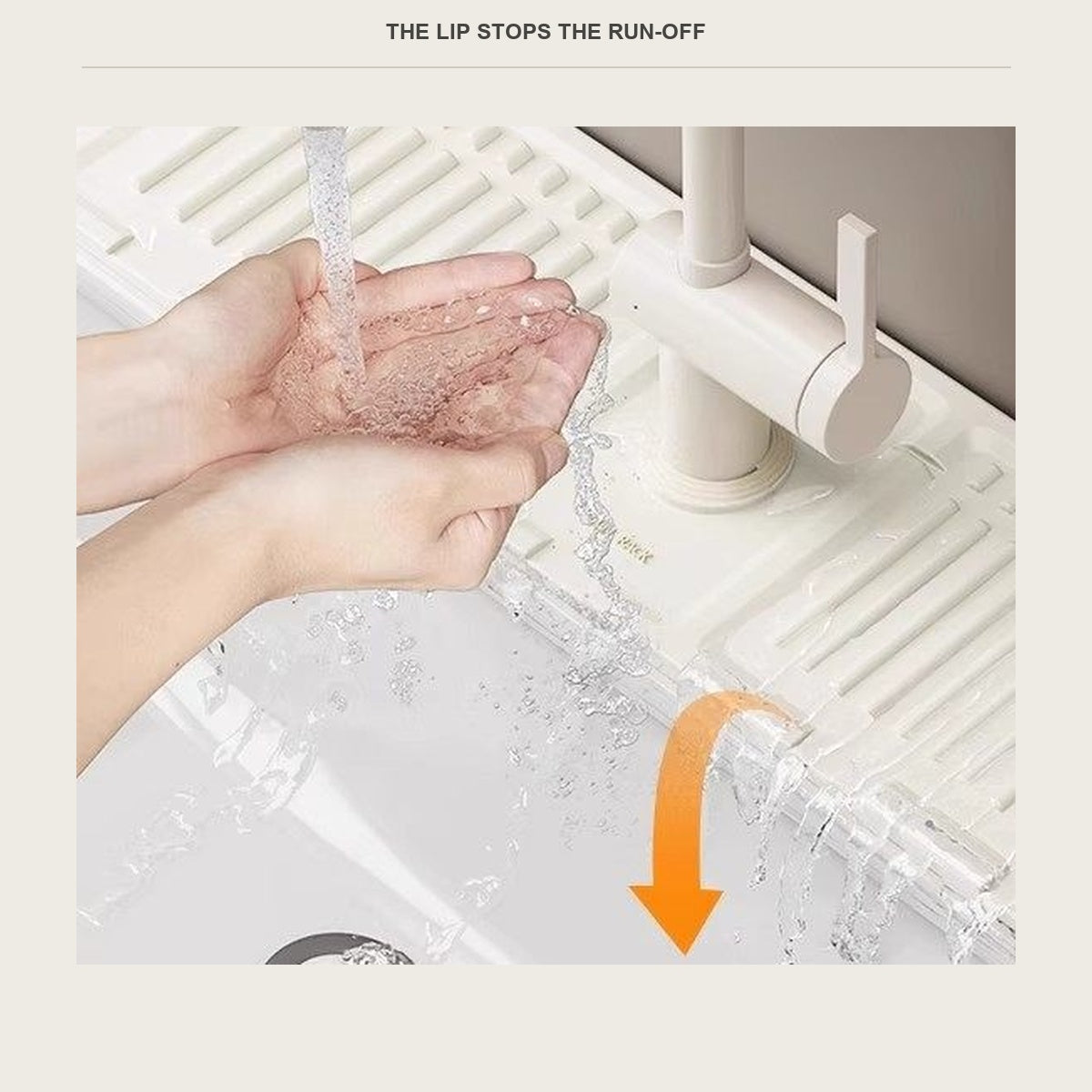 Water running off the folded lip of the mat back into the sink