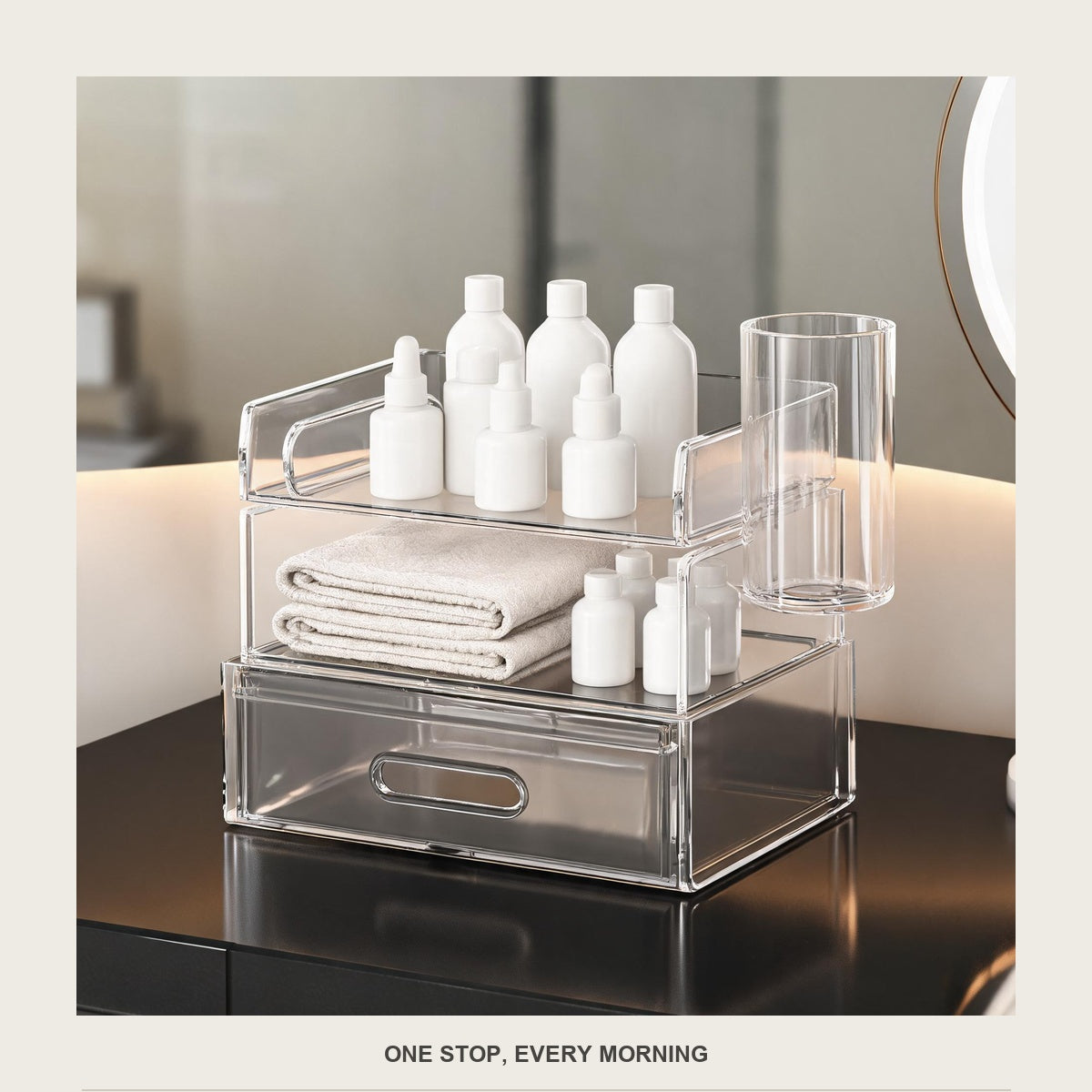 The acrylic organizer on a bathroom counter near a mirror with plain unbranded bottles inside