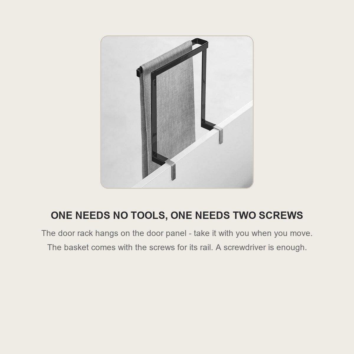 The door rack hanging on a cabinet door with a dish towel