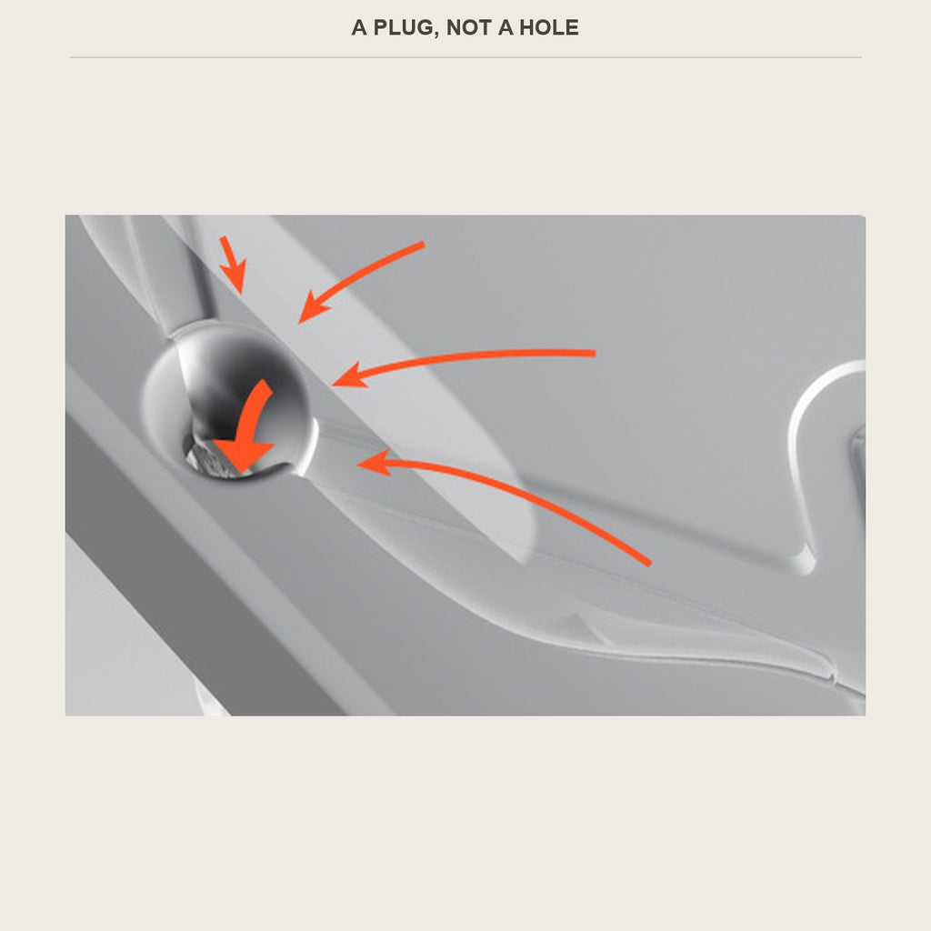 Close up of the push-to-drain plug on the cabinet mat