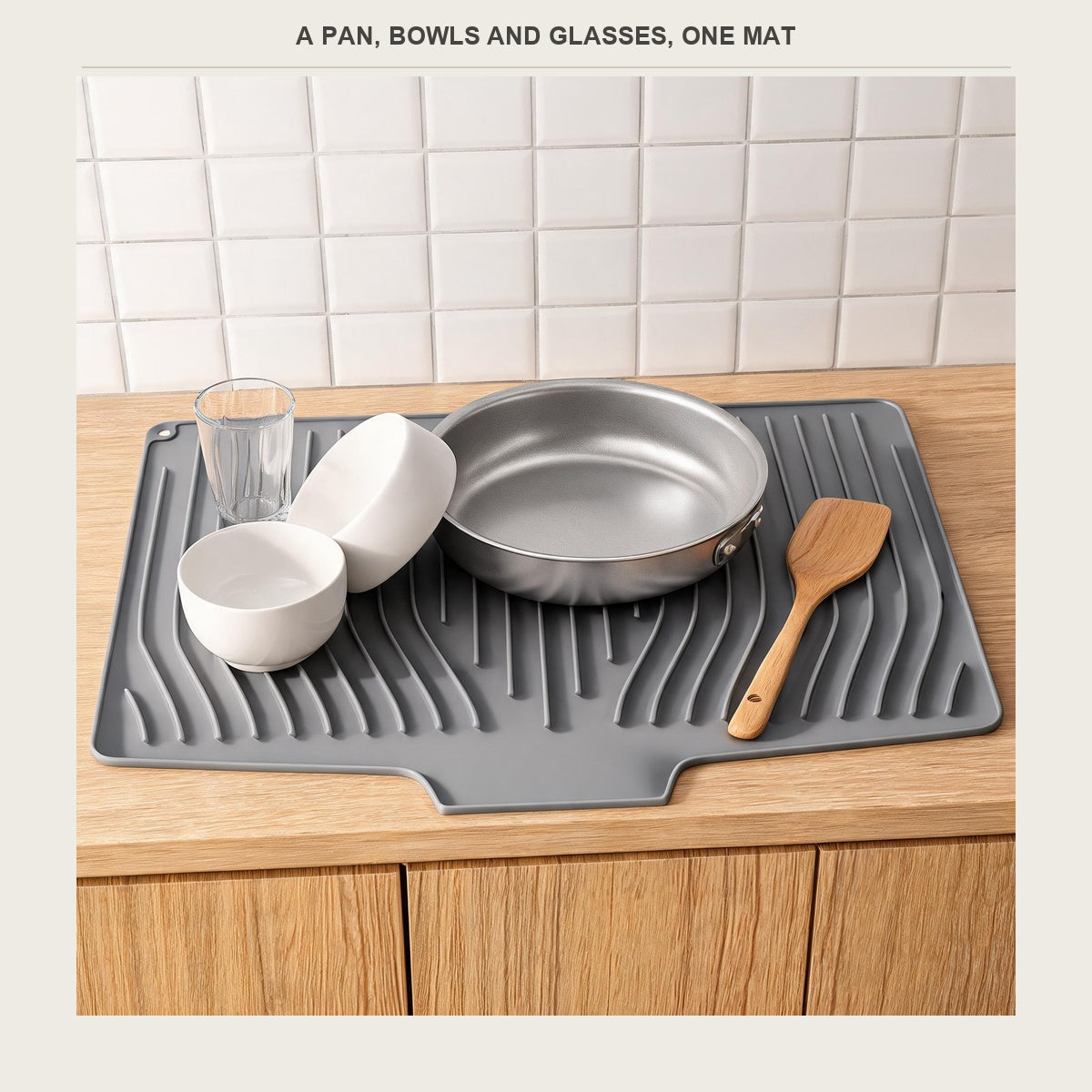 Dish mat holding a pan, bowls and glasses