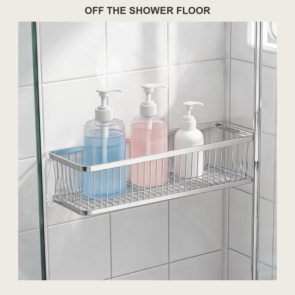 Rectangular stainless wire shower caddy on a tiled shower wall holding bottles