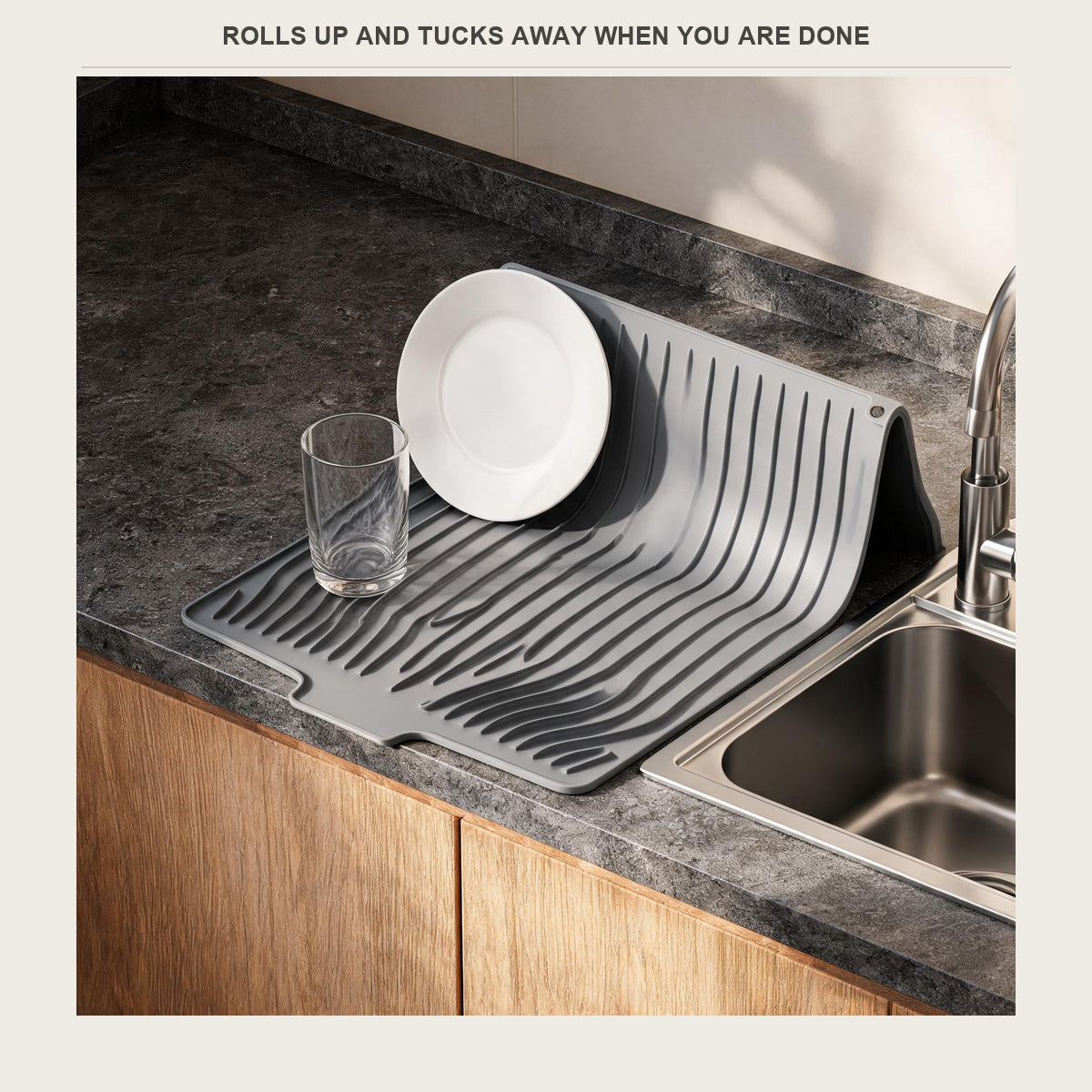 Folded dish drying mat beside the sink