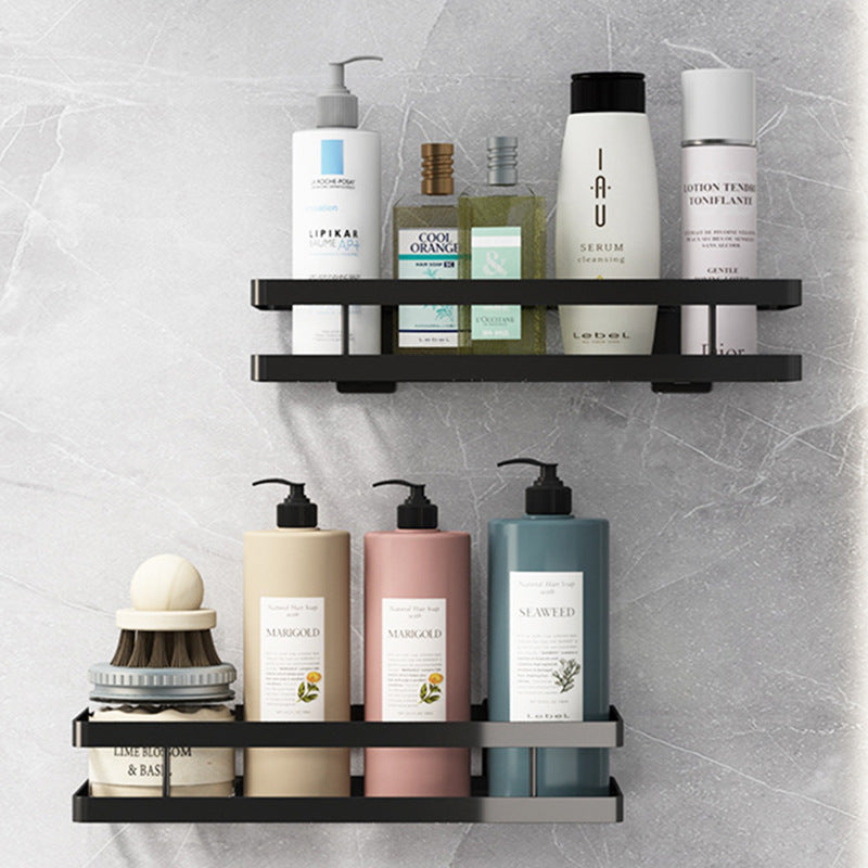 No-drill shower caddy holding daily essentials in a grey tiled shower