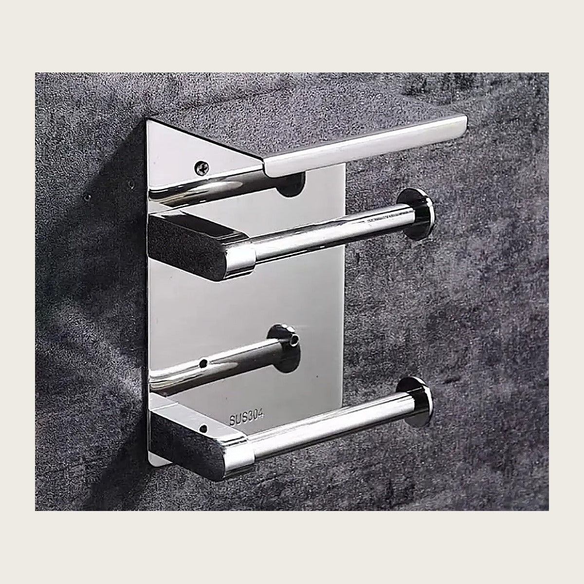 SUS304 stainless steel single roll toilet paper holder on a stone wall