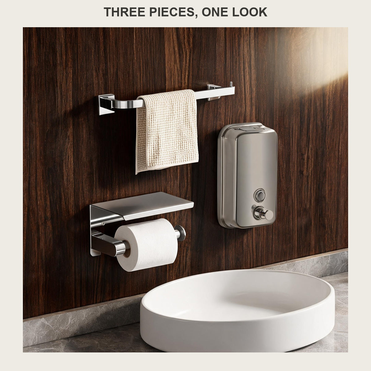 Three-piece brushed steel bathroom set on a walnut panelled wall above a white vessel basin