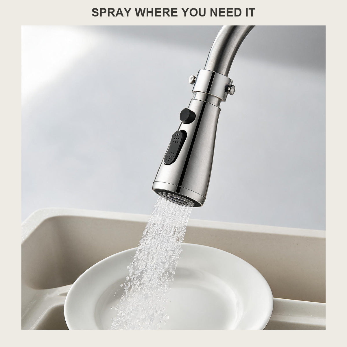 Hand holding the chrome 3-mode faucet sprayer head, showing its 720-degree rotation