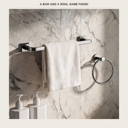 Brushed stainless towel bar and ring set on a bathroom wall