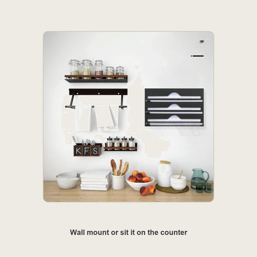 Acrylic wrap organizer mounted on a kitchen wall holding foil and wrap
