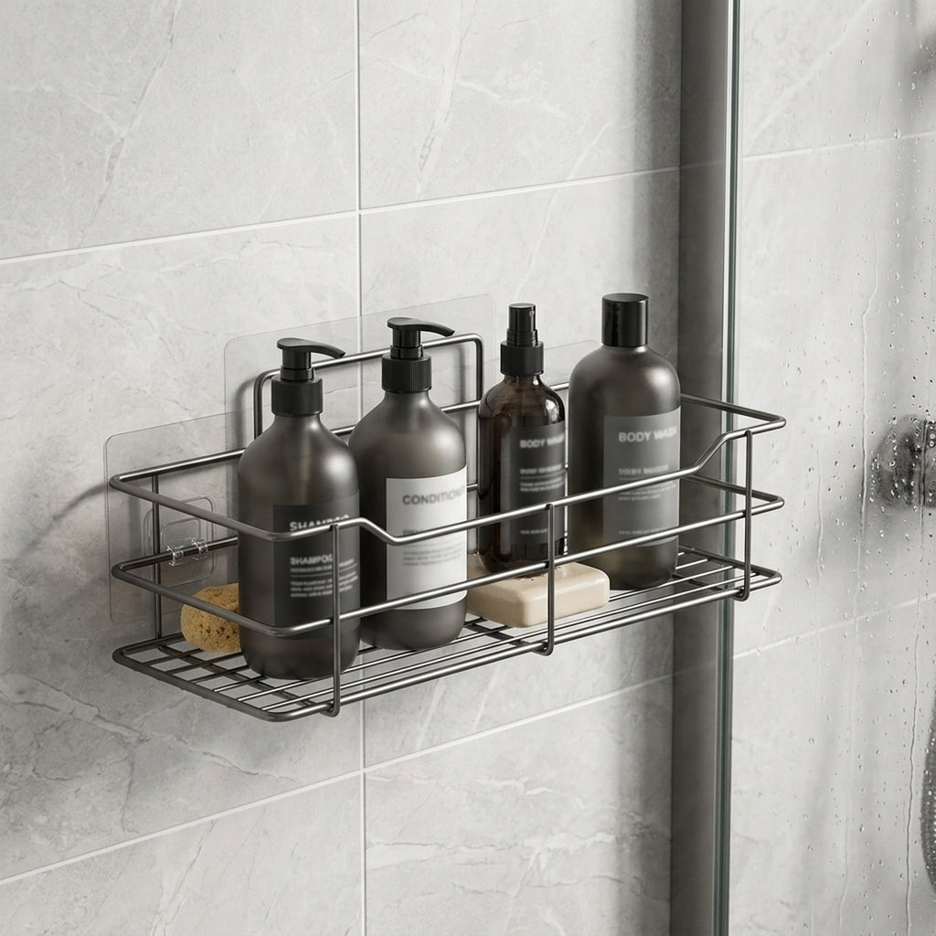 Stainless shower caddy installed in a glass-door shower corner, bottles organized